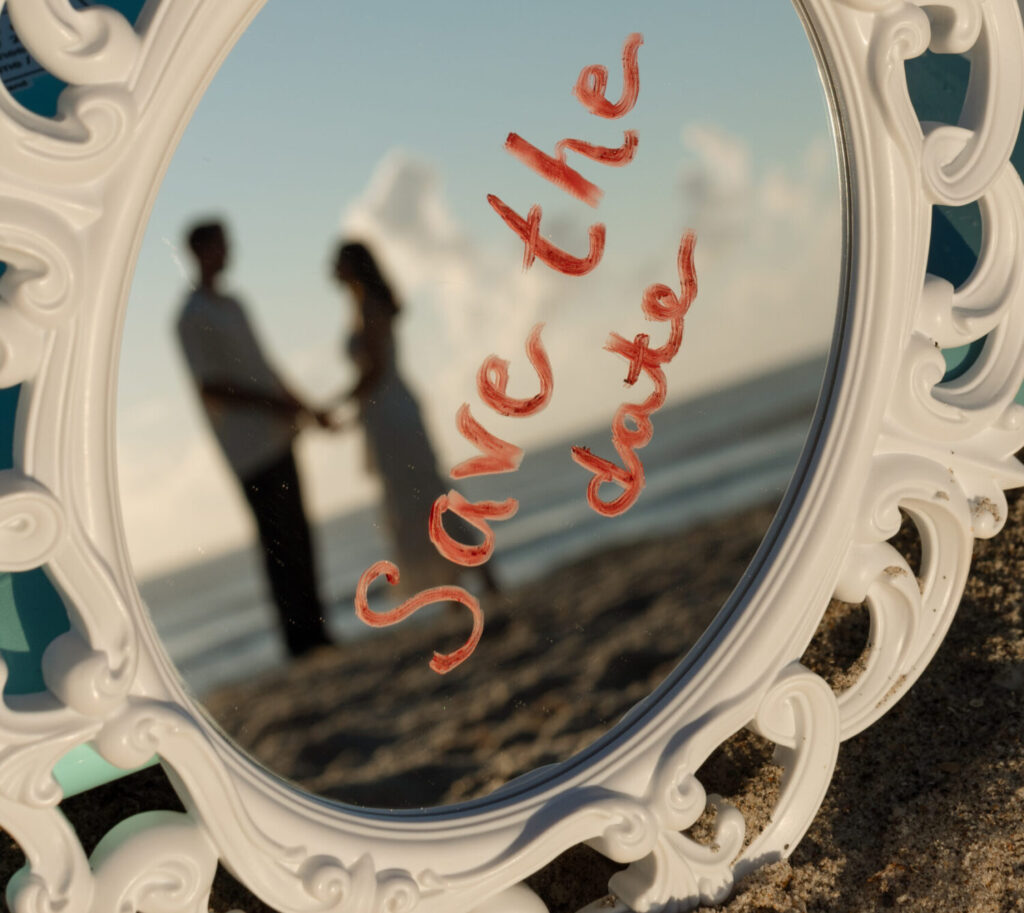 Custom save the date featuring an engagement photo of the couple