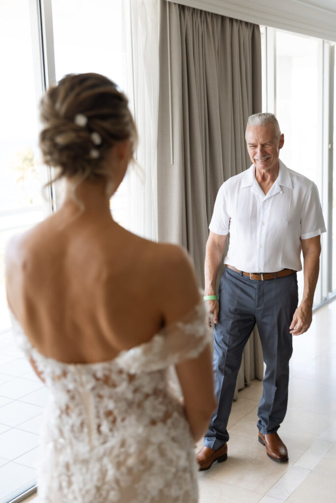 Capturing a special moment with bride and her dad during the first look