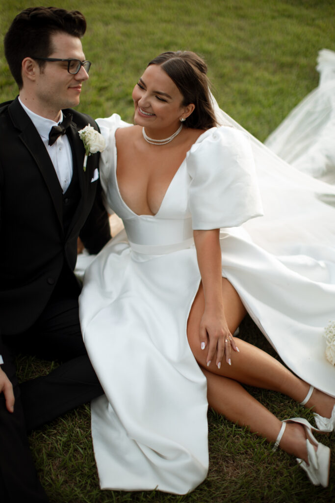 Bride and groom during sunset at Bella Collina, captured by The Deans Photography, with the sun setting over the picturesque hills and Tuscan architecture.