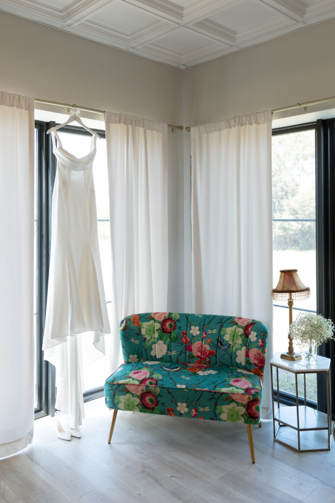 Wedding dress in bridal suite at Lavender on the Lake, photographed by The Deans Photography