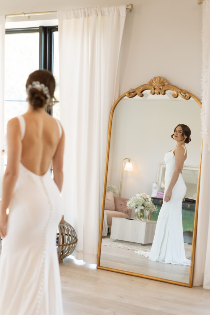 Bride in bridal suite at Lavender on the Lake, photographed by The Deans Photography