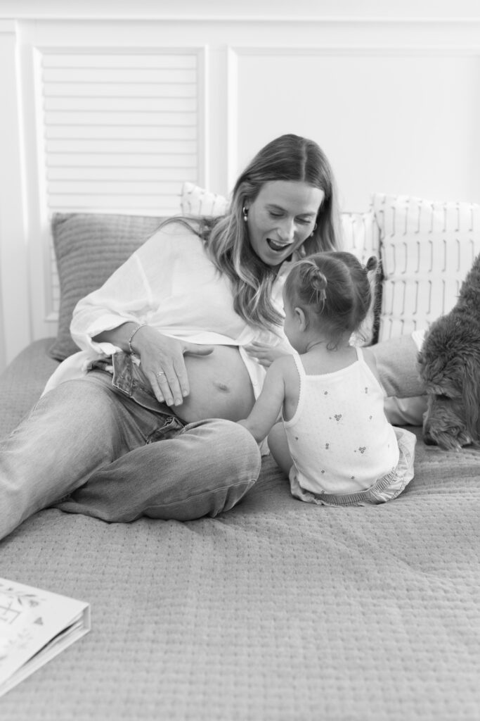 Family maternity photo session with expecting mom and older child in Viera, Florida.