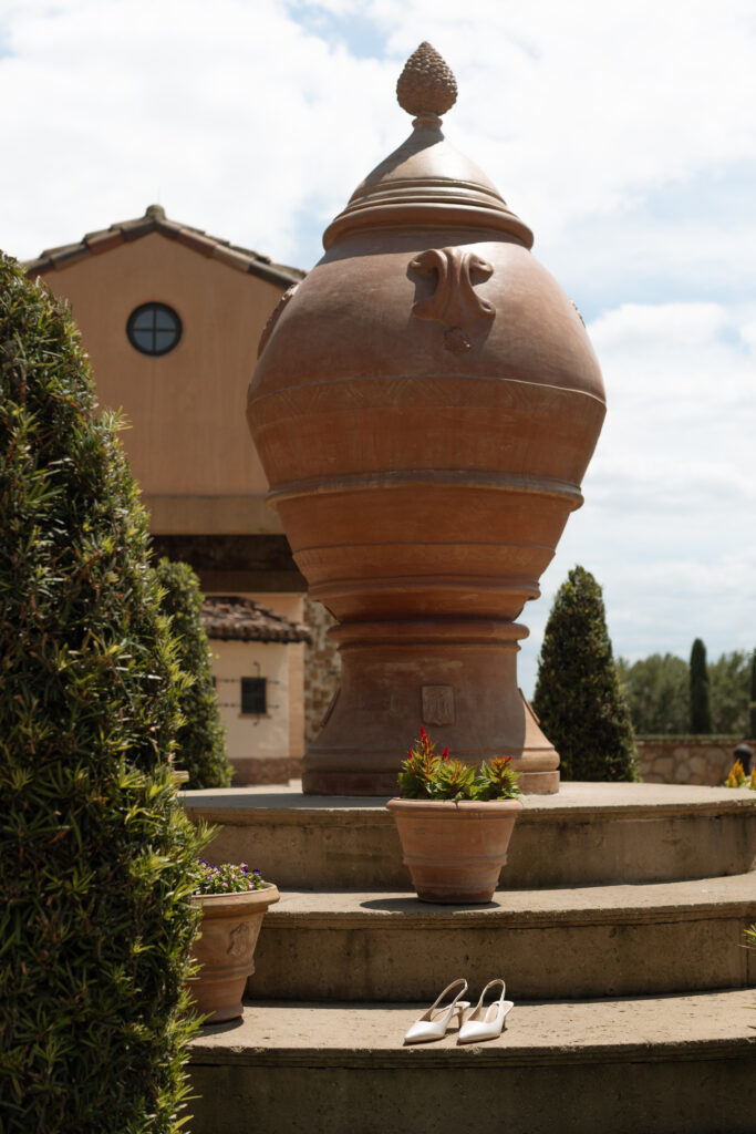 Shoe details with a Tuscan backdrop photographed by The Deans Photography.