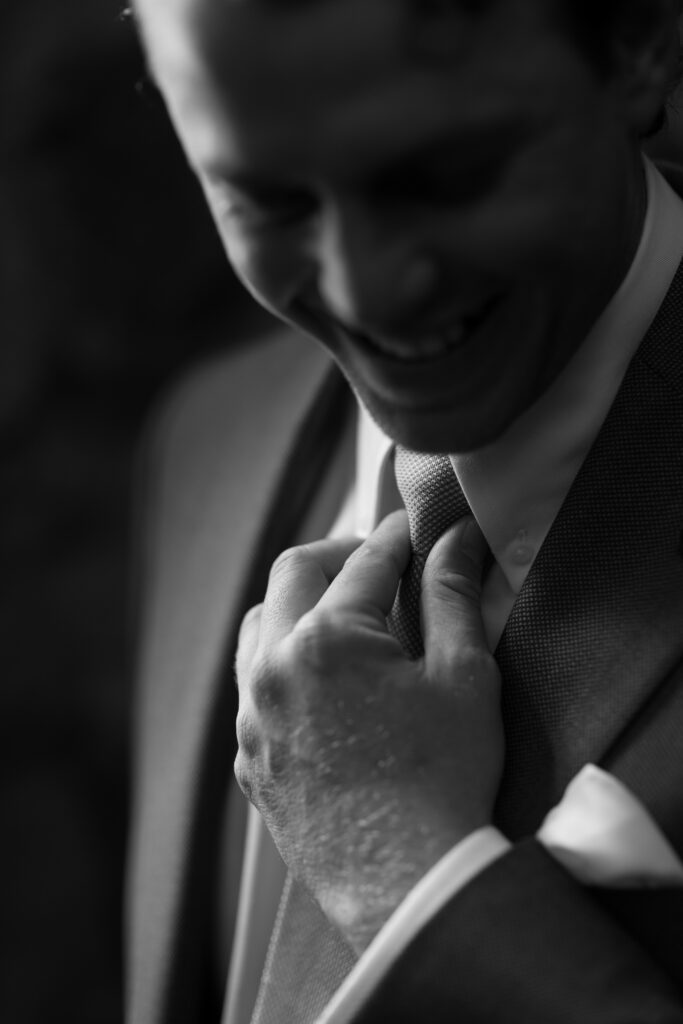 groom getting ready at Bella Collina in Montverde, Florida