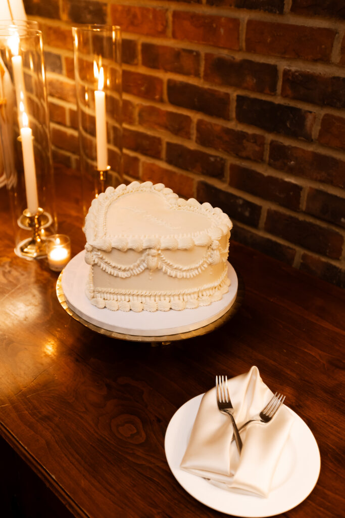 Wedding cake details with a Tuscan backdrop photographed by The Deans Photography.