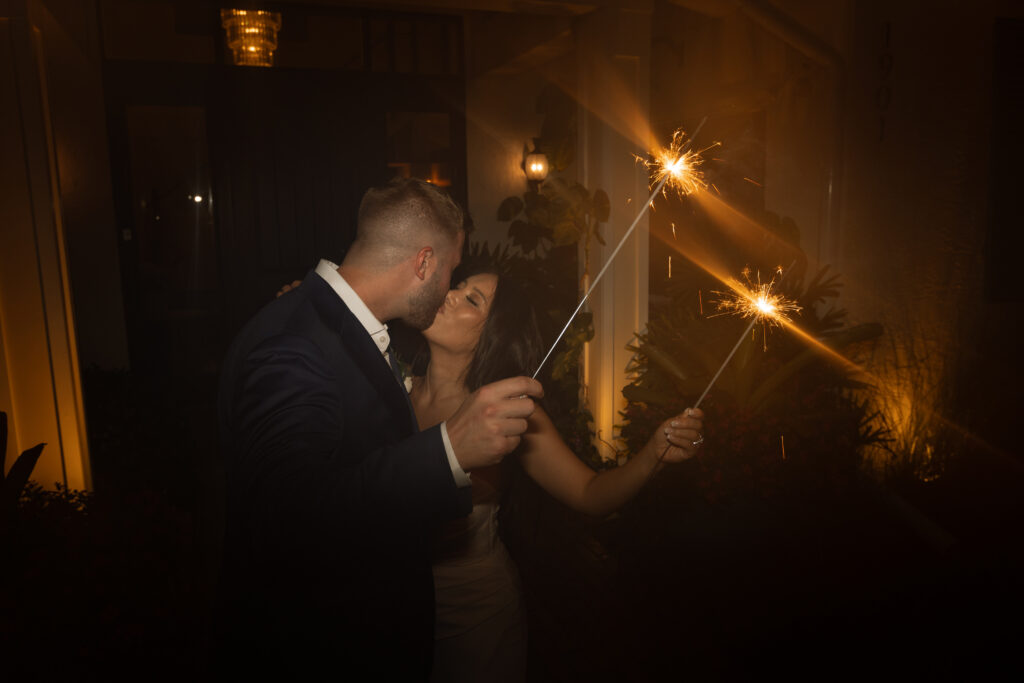 Wedding night, sparkler send off of couple in Indian Harbour Beach, Florida.