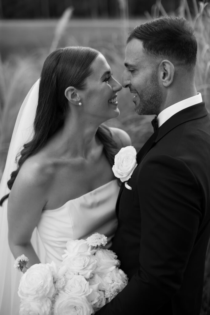 Intimate moment of couple at their wedding venue at the Four Seasons photographed by The Deans Photography.