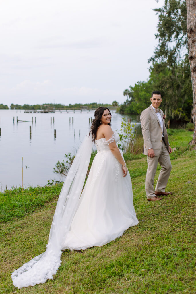 Intimate moment of couple walking towards the sunset, photographed by The Deans Photography.