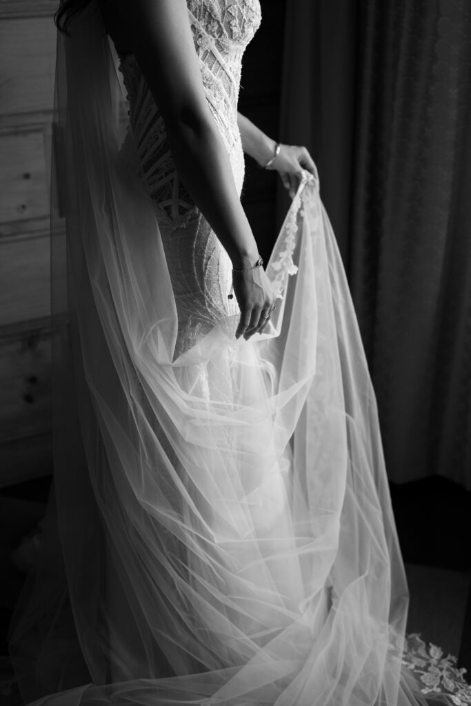 Close-up of wedding details including bride’s dress, shoes, and rings, captured at a destination wedding in Costa Rica by The Deans Photography.