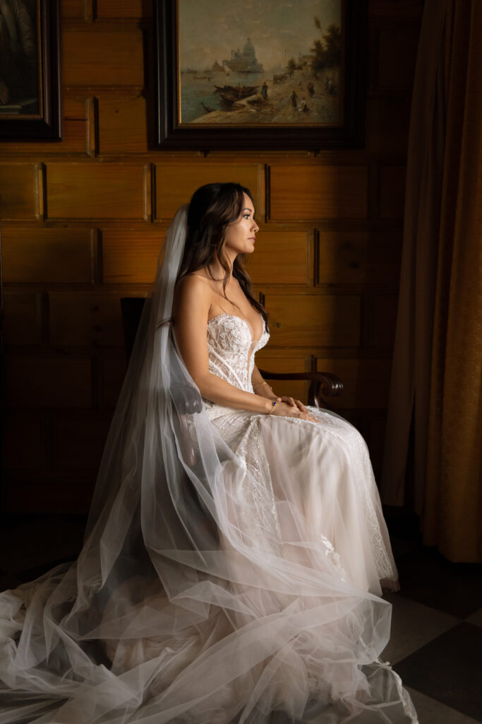 Close-up of wedding details including bride’s dress, shoes, and rings, captured at a destination wedding in Costa Rica by The Deans Photography.