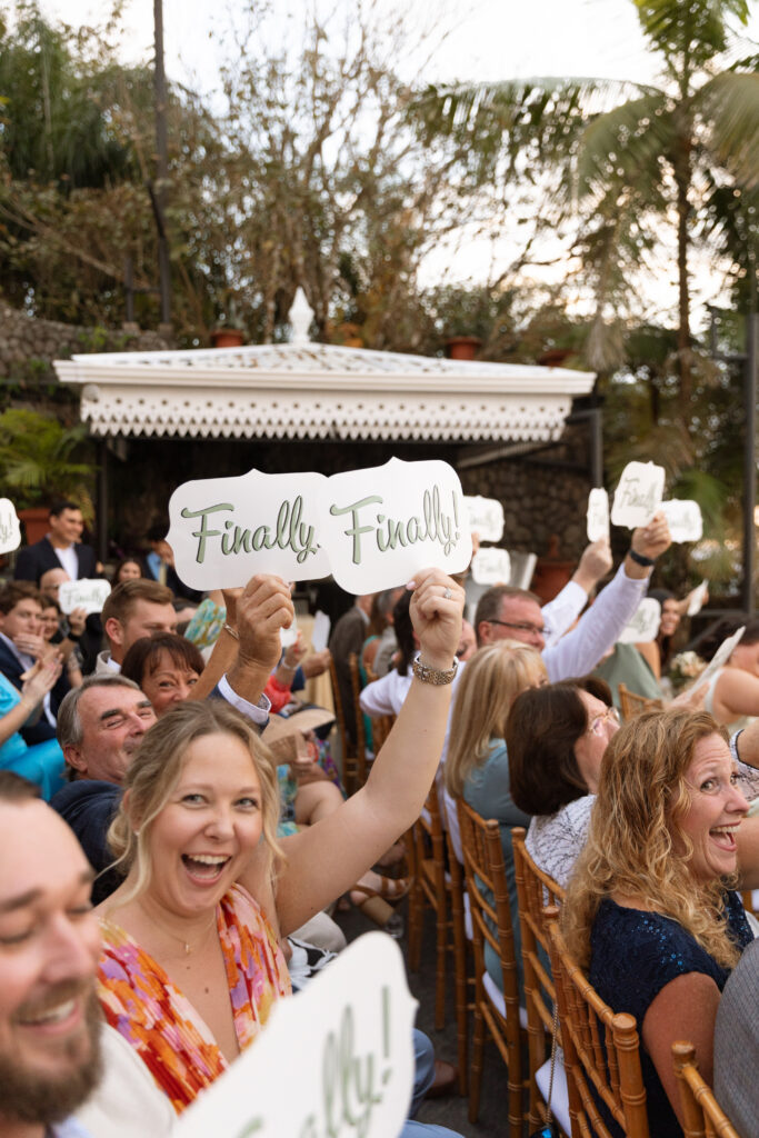 Wedding guests celebrating and enjoying the reception at Villa Caletas, Costa Rica, during a destination wedding captured by The Deans Photography.