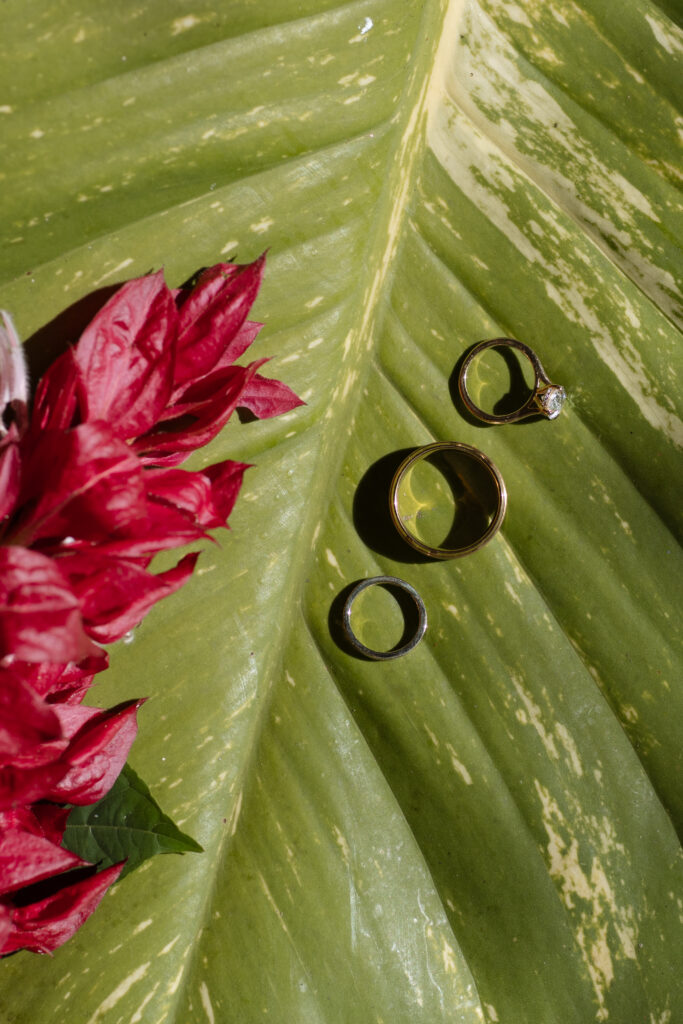 Close-up of wedding details including bride’s dress, shoes, and rings, captured at a destination wedding in Costa Rica by The Deans Photography.