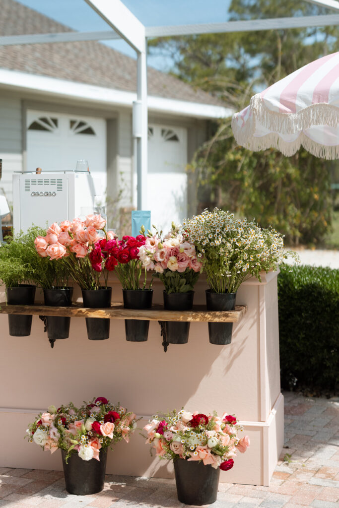 Chic coffee cart at a garden party baby shower