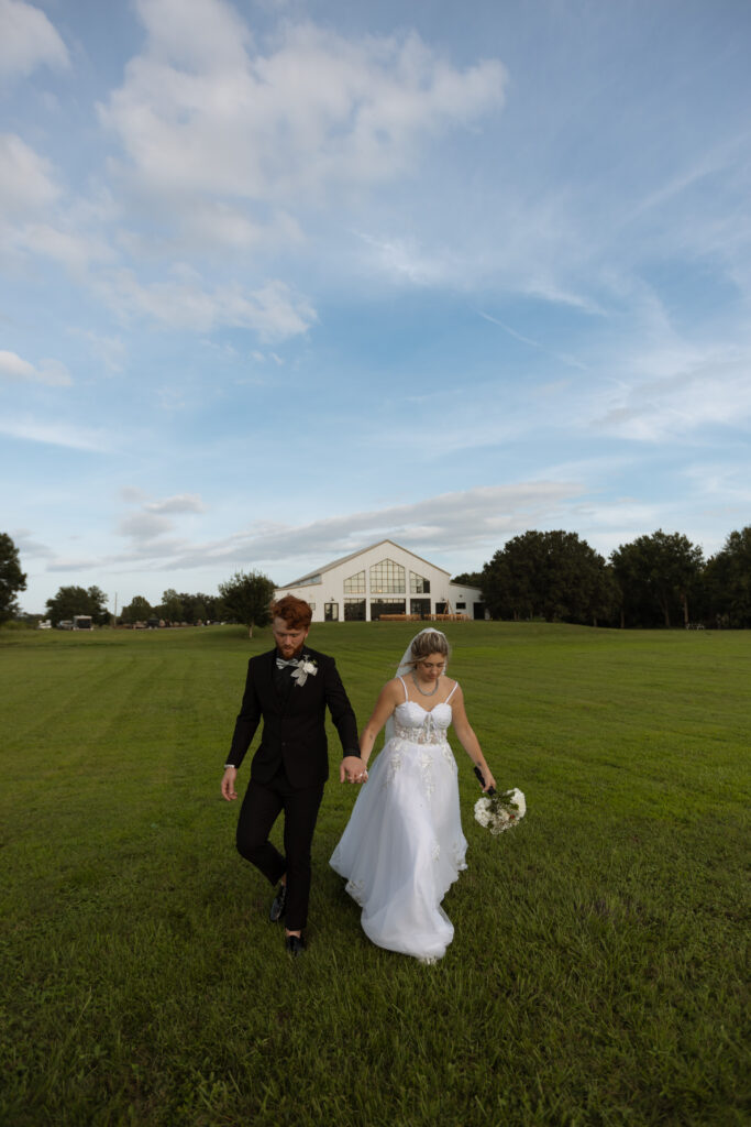Couple walking with LOTL in the background