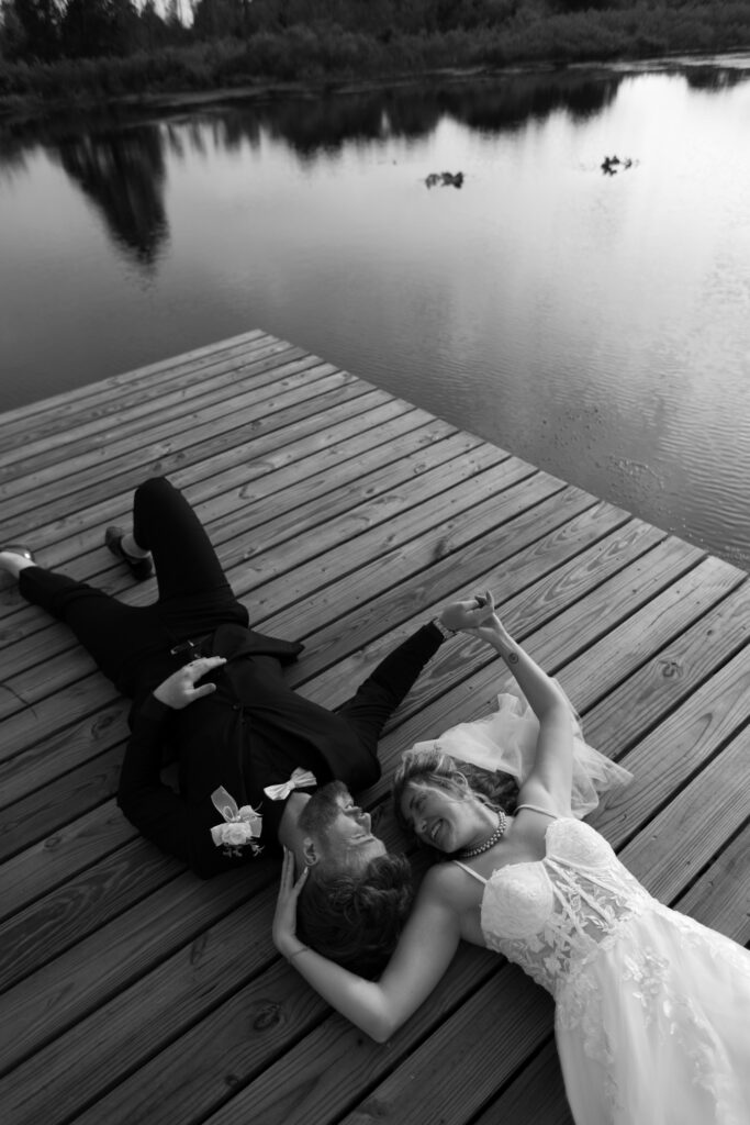 couple on the dock at lavender on the lake in black and white