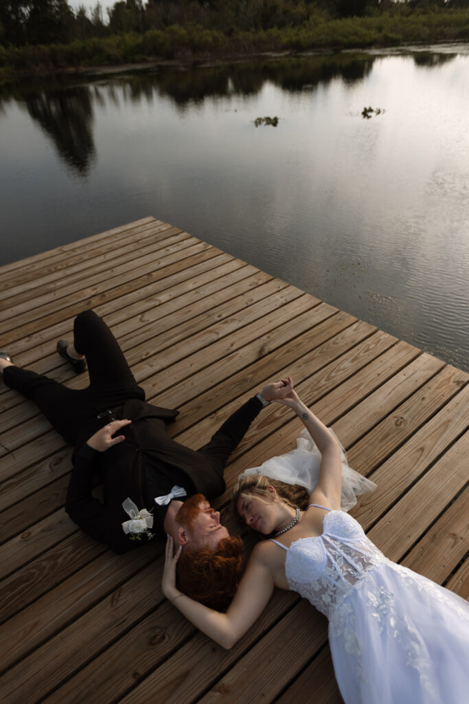 couple on the dock at lavender on the lake