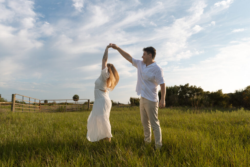 couple dancing during their engagement session photoshoot