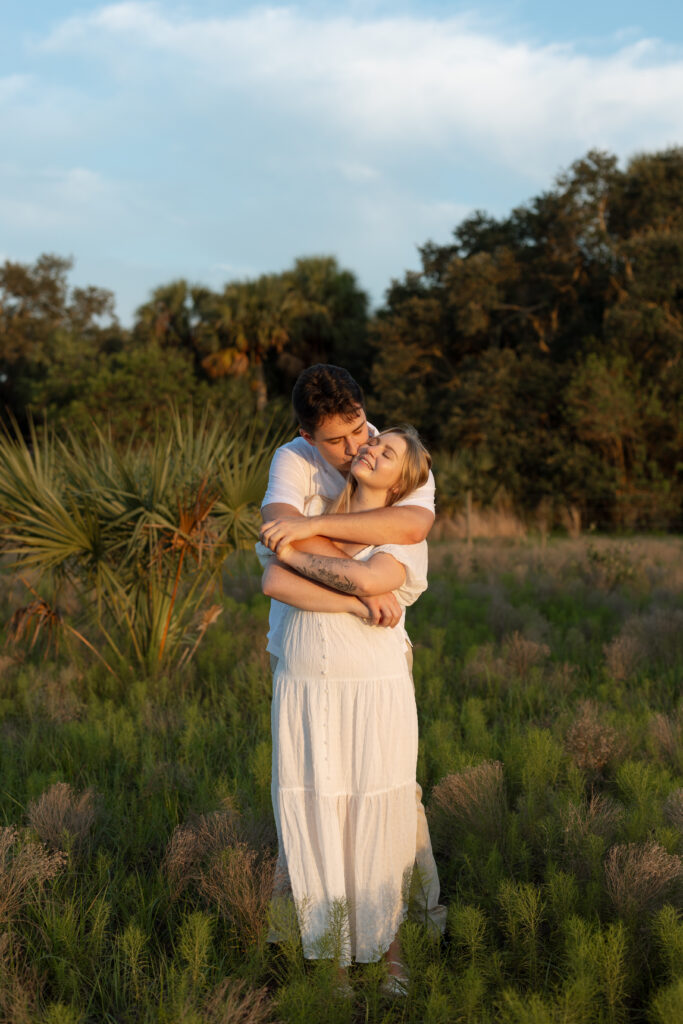 Sweet moment during their engagement session