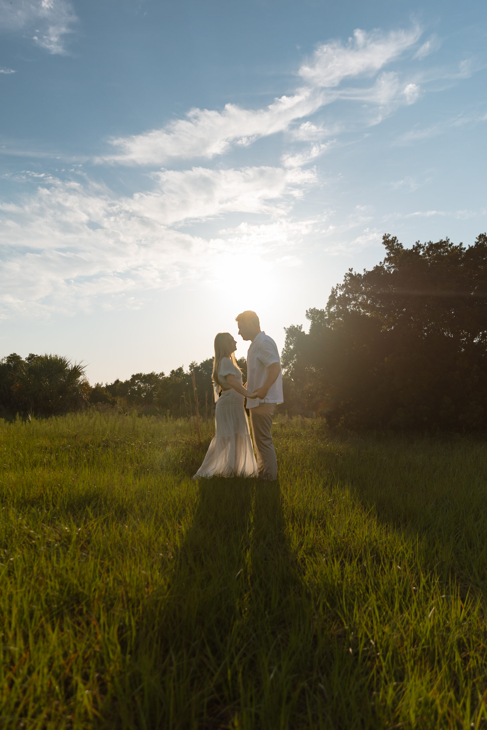 couple during their engagement session in golden hour